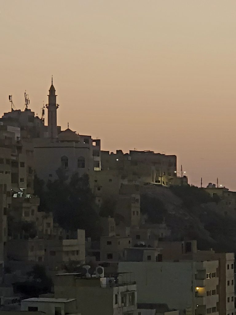 A mosque stands out along the eastern skyline of Amman.