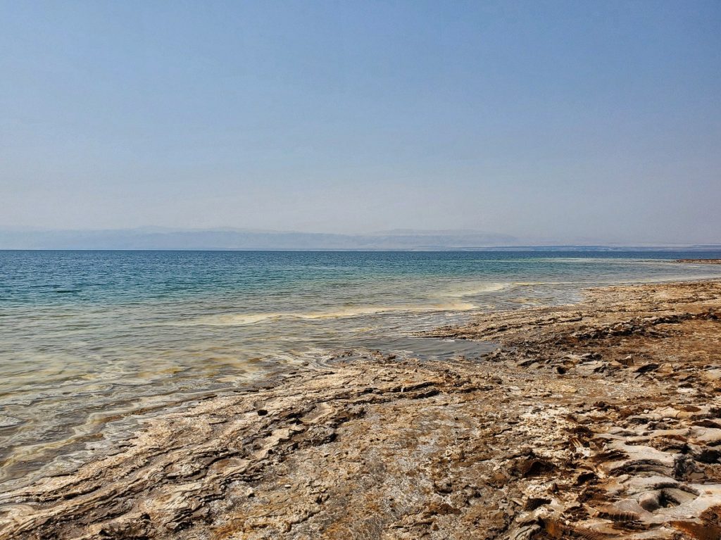 The Dead Sea shoreline's pebbled beach.